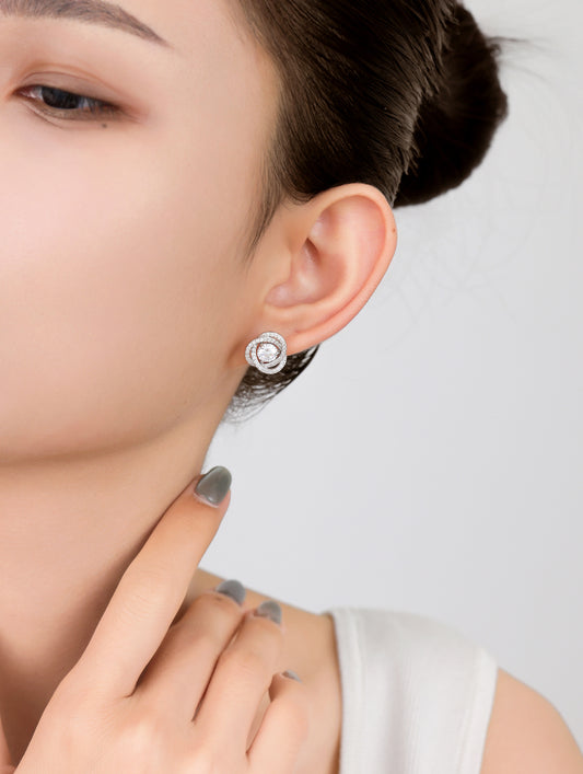 Versatile sterling silver earrings offering two looks in one.