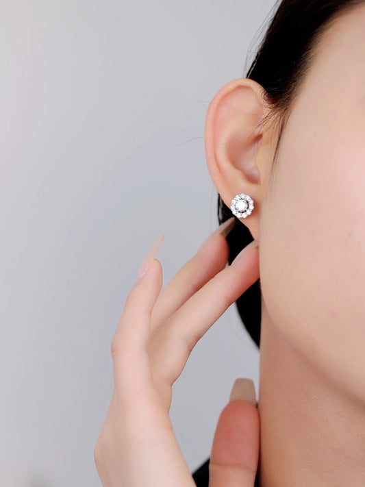 Elegant silver earrings featuring a detachable solitaire centerpiece