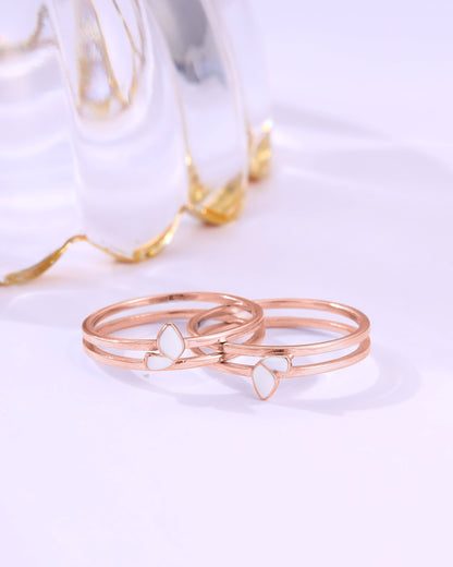 Sterling silver detachable ring with white enamel flower design — elegant and nature-inspired.