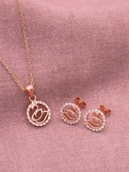Rose gold swan pendant with zircon stones and matching chain — elegant and luxurious jewelry piece.