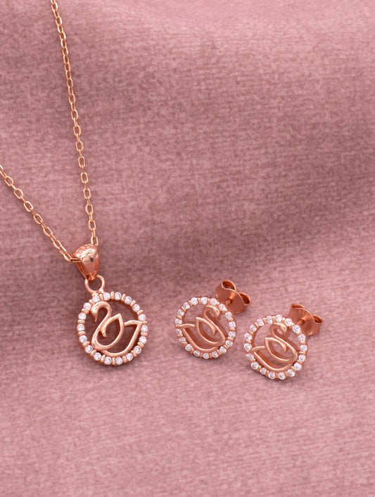 Rose gold swan pendant with zircon stones and matching chain — elegant and luxurious jewelry piece.