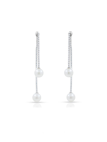 Contemporary hanging pearl earrings blending elegance and sophistication.