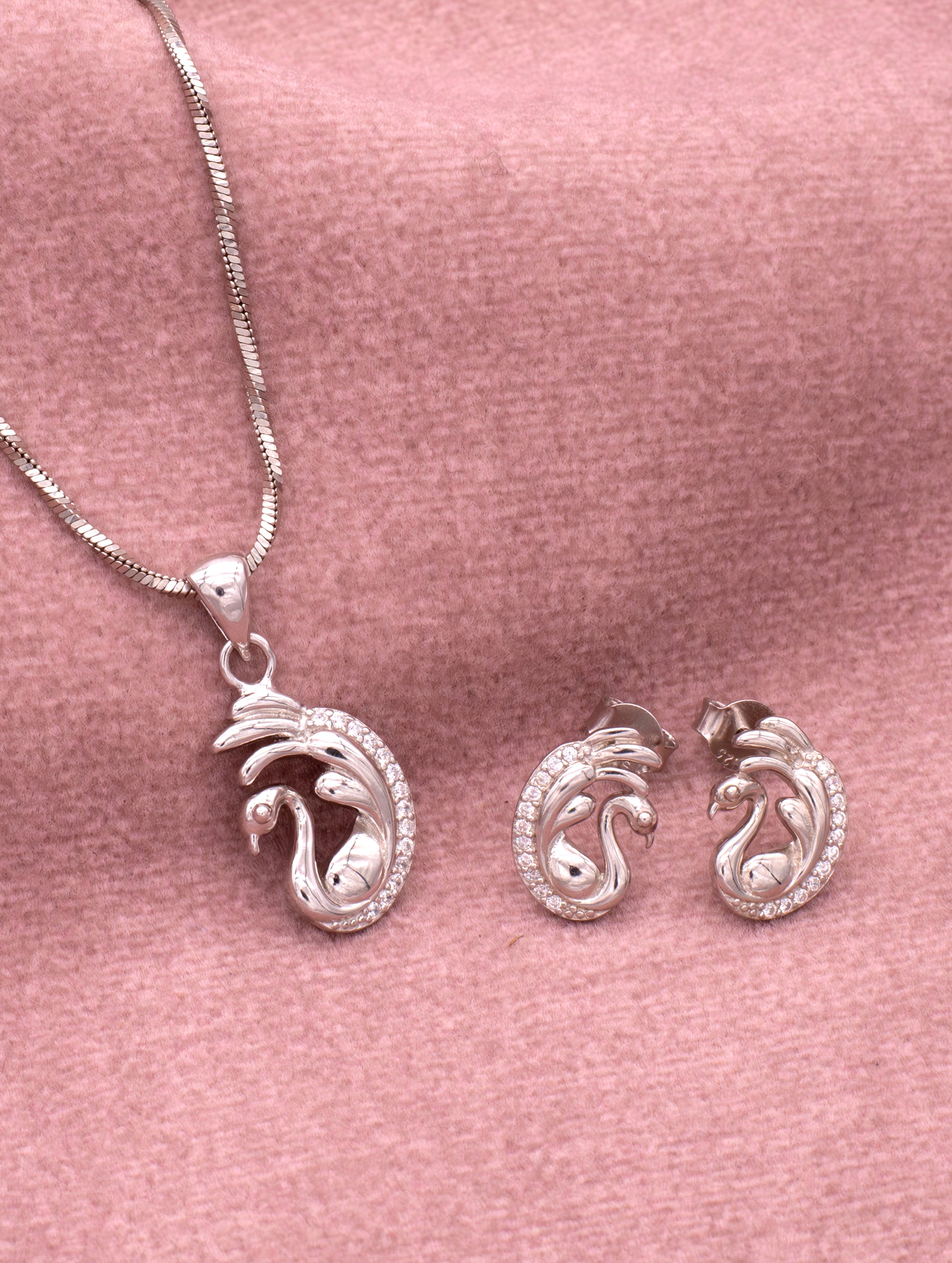 Exquisite silver swan pendant adorned with shimmering zircon stones — elegant and timeless design.