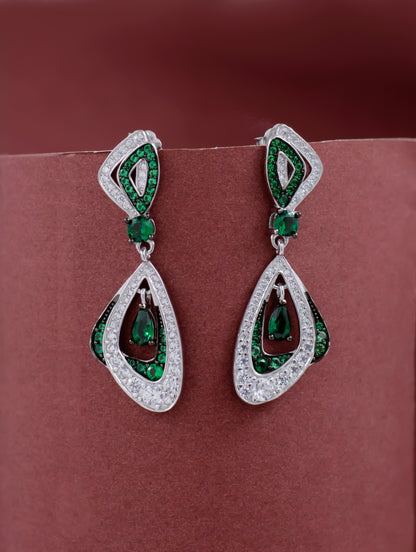 Elegant silver earrings featuring emerald center and zircon border.