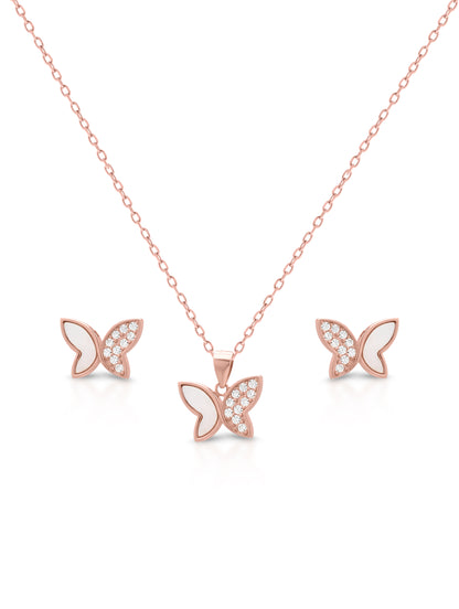 Close-up of rose gold butterfly pendant with Swarovski crystals and mother of pearl detailing, timeless and graceful design.