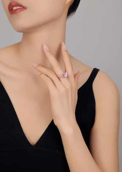 Adjustable silver butterfly ring with pink enamel wings — feminine jewelry.