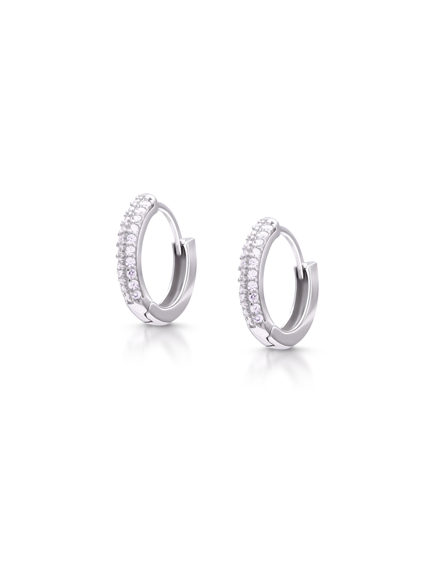 Intricate silver hoop earrings with sparkling zircon stones.
