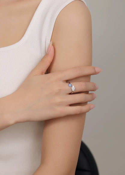 Adjustable sterling silver evil eye ring for women.