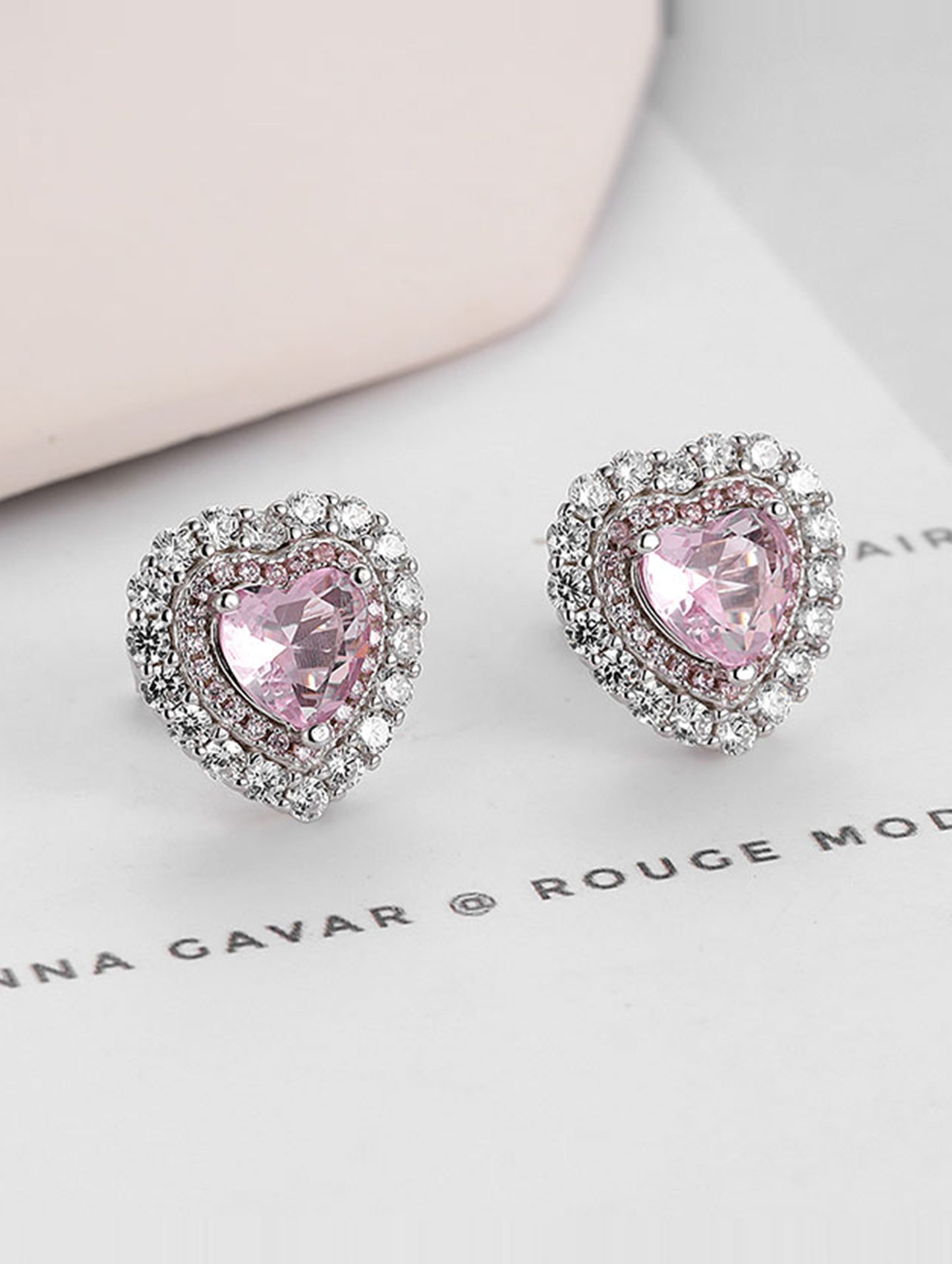 Sterling silver pink heart-shaped earrings with white Swarovski zircons.