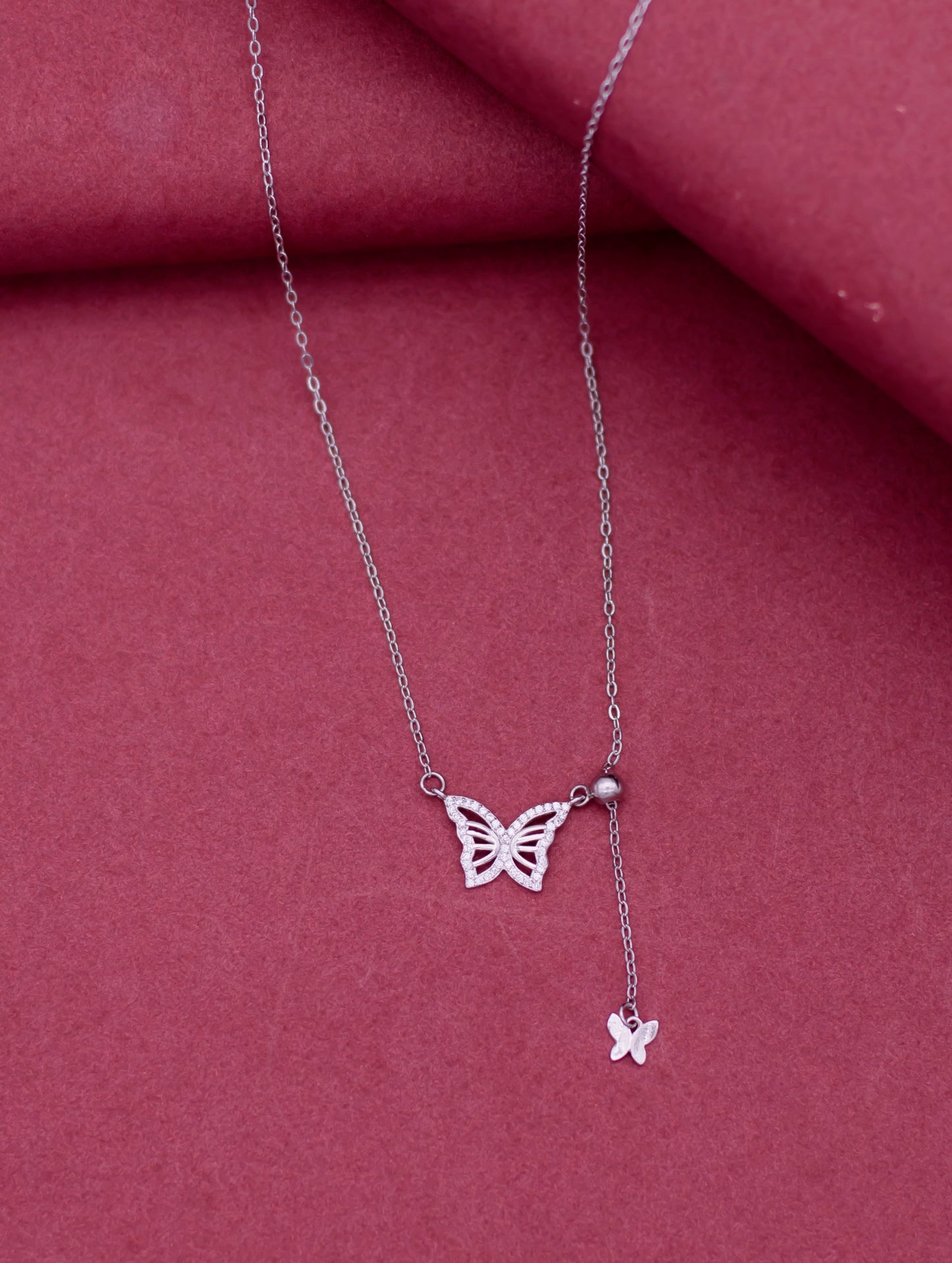 Sterling silver butterfly adjustable chain with Swarovski zircon stones.