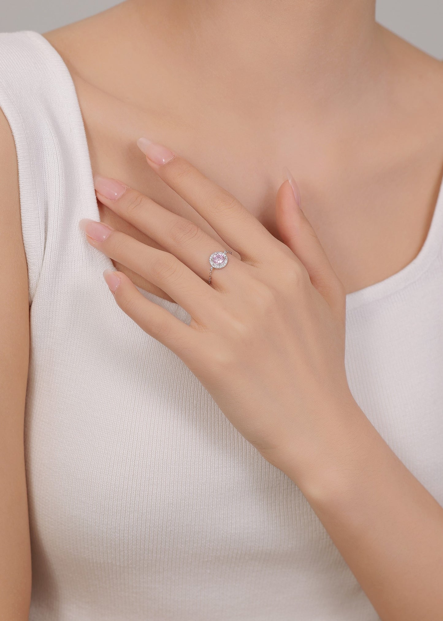 Adjustable 92.5 silver ring with semi-precious pink stone — perfect gift for her.