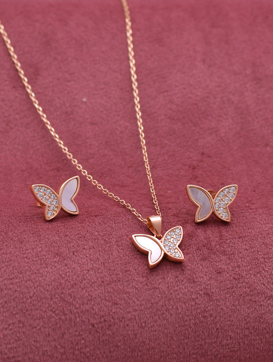 Elegant rose gold butterfly pendant set combining Swarovski sparkle with the natural glow of mother of pearl.