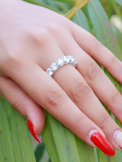 Close-up of silver ring featuring sparkling white Swarovski zircon centerpiece.