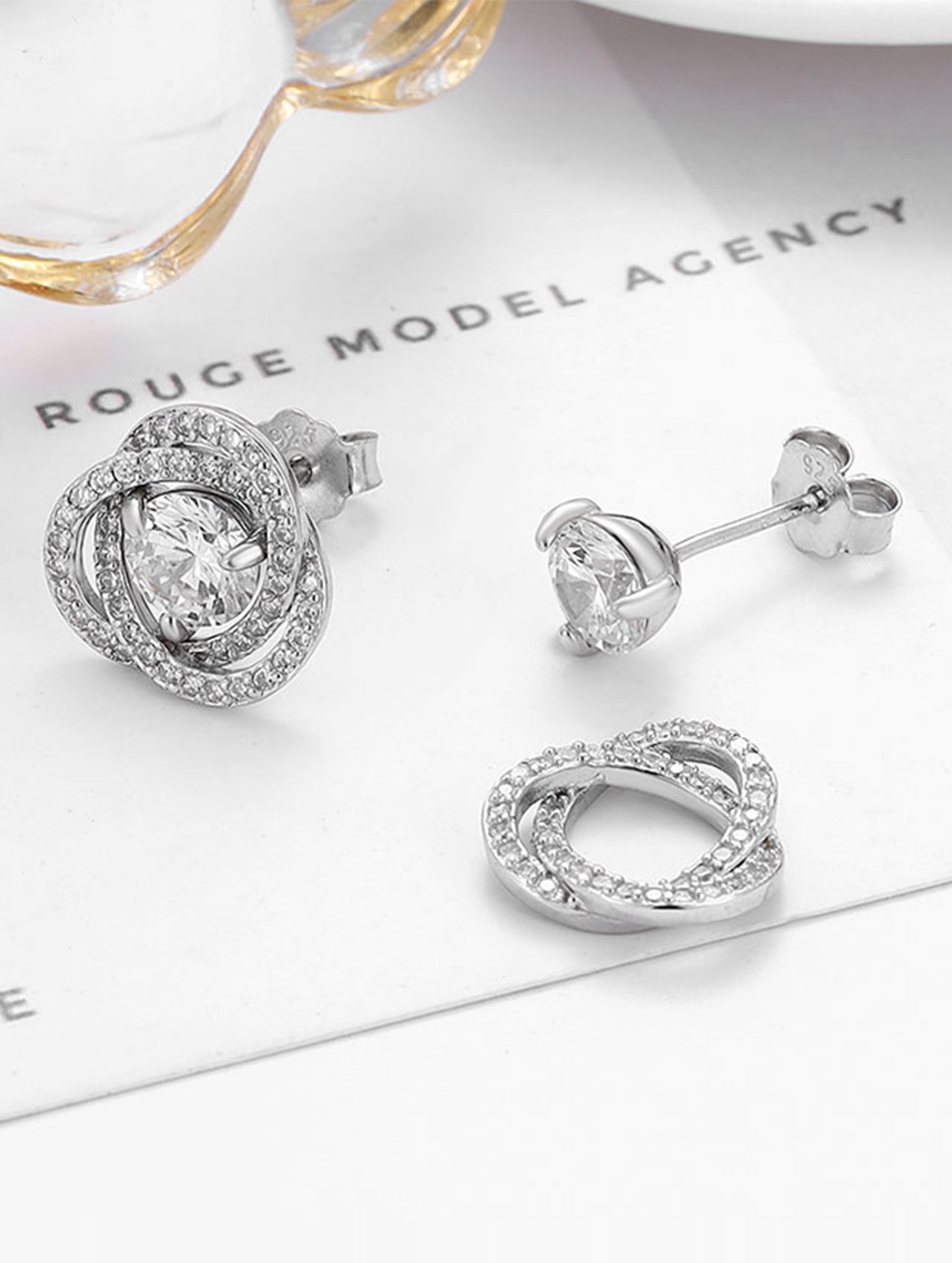 Sterling silver detachable solitaire earrings with white Swarovski zircon.