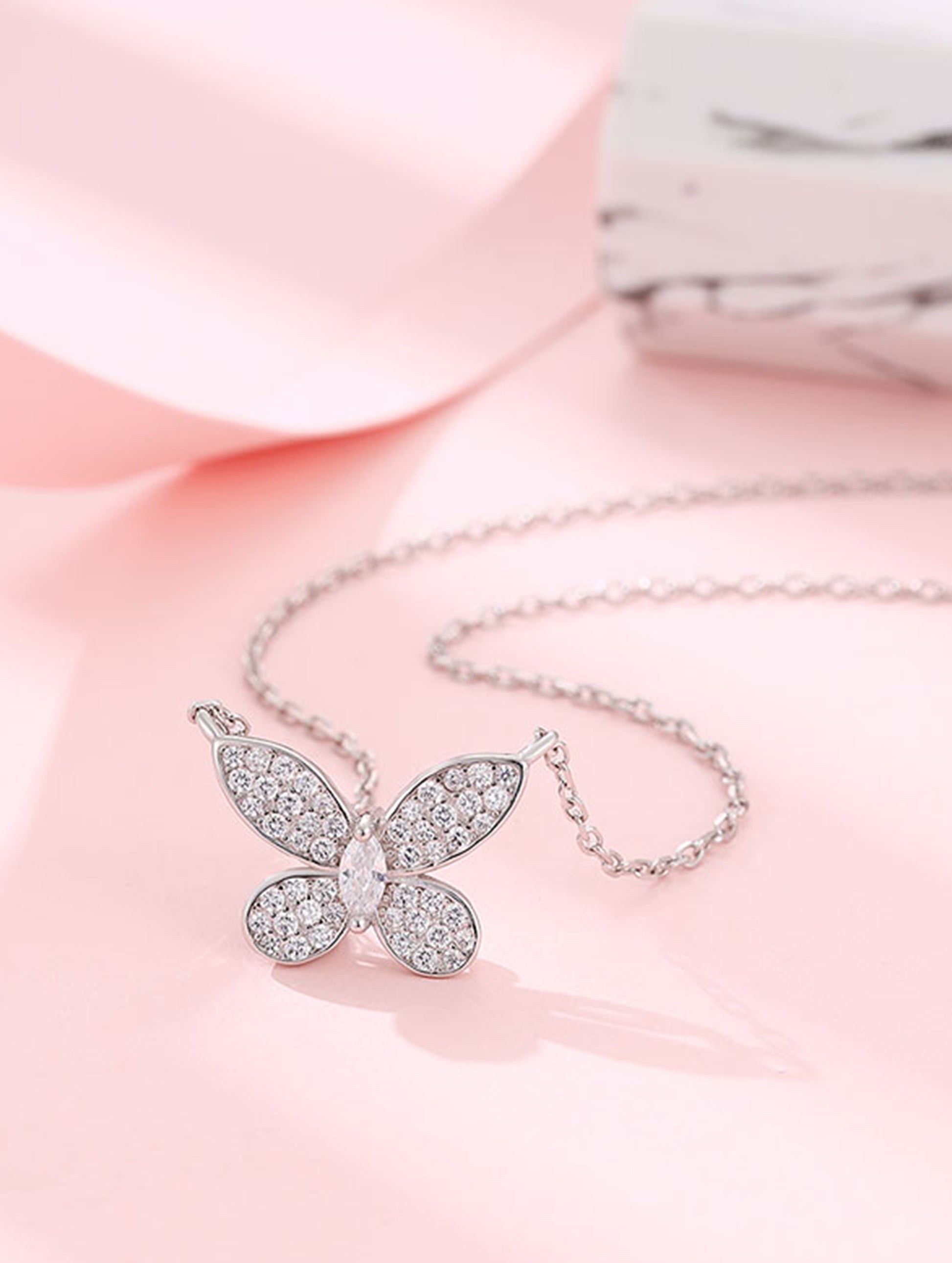 Sterling silver butterfly pendant chain with Swarovski zircon.