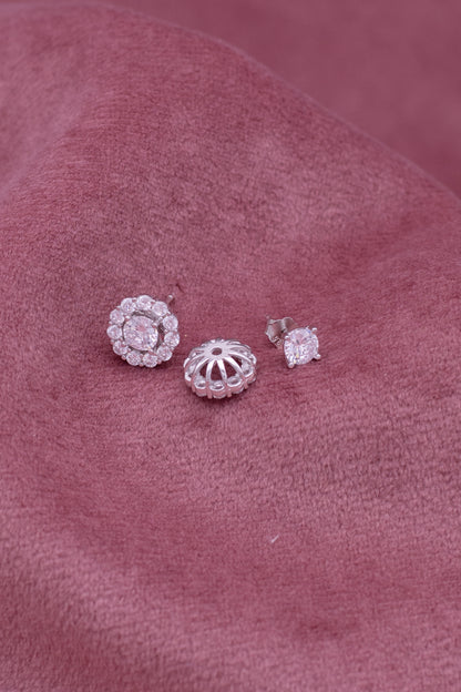 Sterling silver round stud earrings with detachable solitaire and white Swarovski zircon.