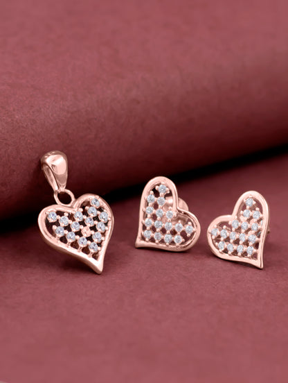 Rose gold heart-shaped pendant set with matching earrings — elegant and romantic jewelry.