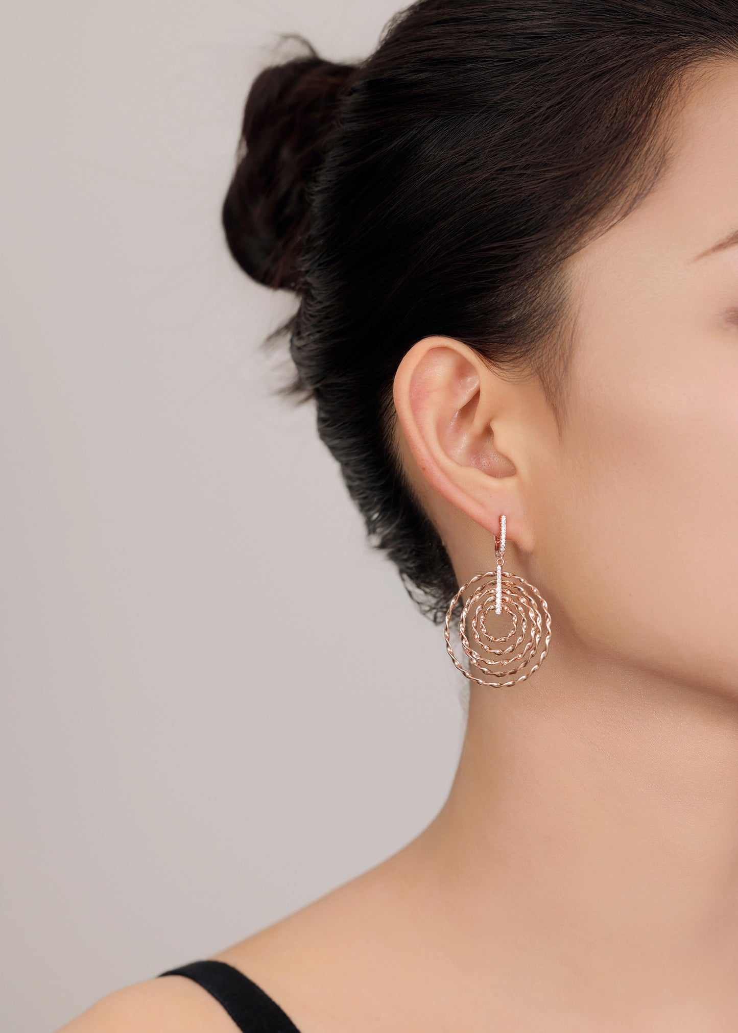 Modern and stylish silver rose gold hoop earrings for women.