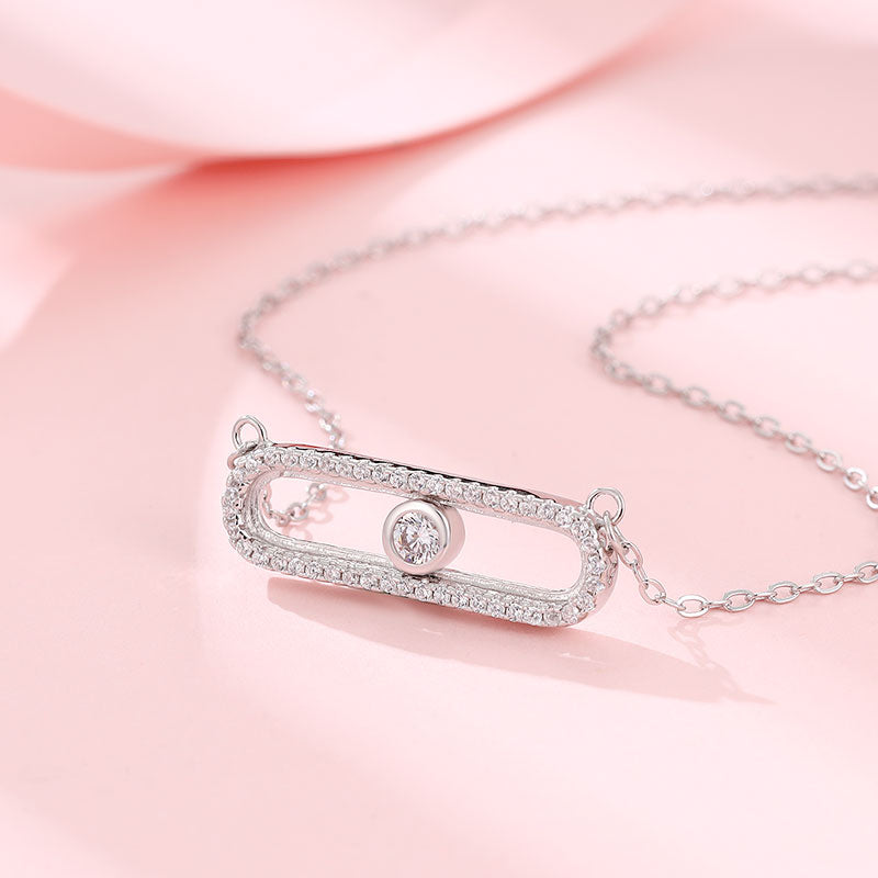 Sterling silver chain featuring a rectangular Swarovski zircon pendant.