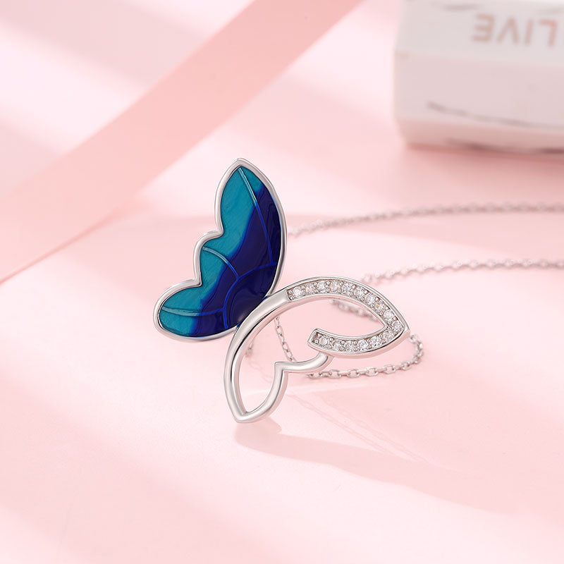 Sterling silver enamel butterfly chain with white Swarovski zircon.

