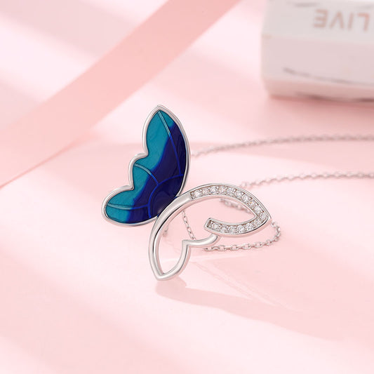 Sterling silver enamel butterfly chain with white Swarovski zircon.


