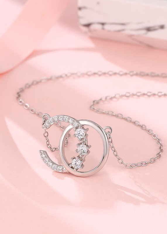 Sterling silver chain with dazzling rectangular Swarovski zircon pendant.