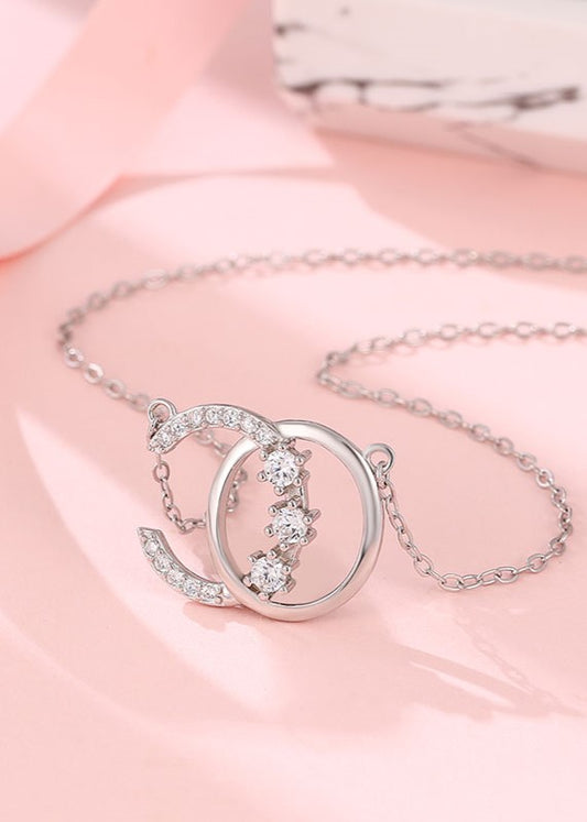 Sterling silver chain with dazzling rectangular Swarovski zircon pendant.