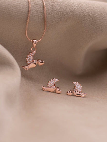 “Elegant nature-inspired bird necklace in rose gold finish”