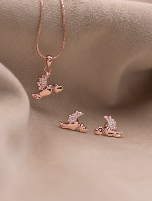“Elegant nature-inspired bird necklace in rose gold finish”