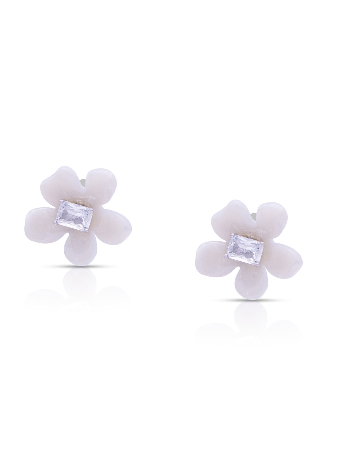 Delicate silver floral studs for everyday and festive wear.