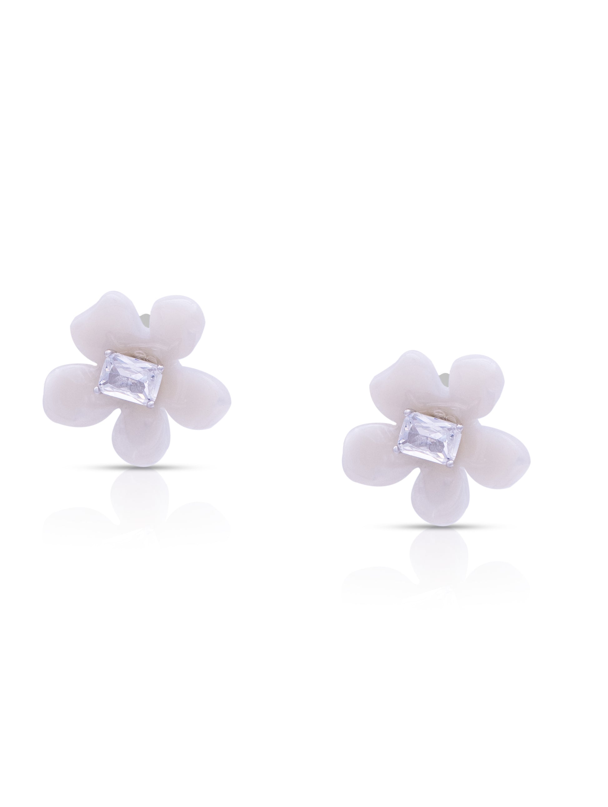 Delicate silver floral studs for everyday and festive wear.