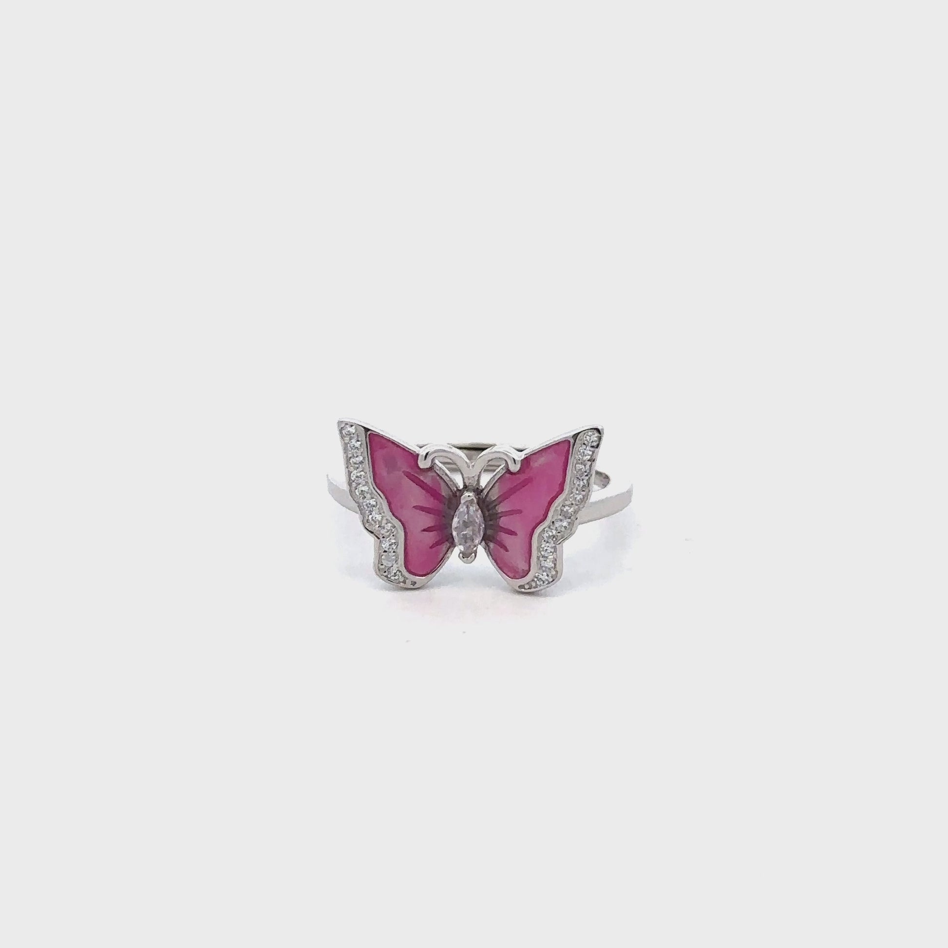 Stylish pink enamel butterfly ring in sterling silver with white Swarovski zircon accents.