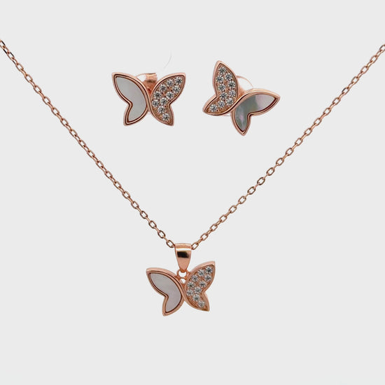 Elegant rose gold butterfly pendant set combining Swarovski sparkle with the natural glow of mother of pearl.