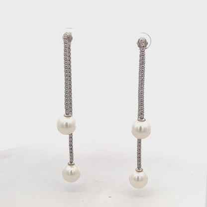 Classic silver and pearl drop earrings for women
