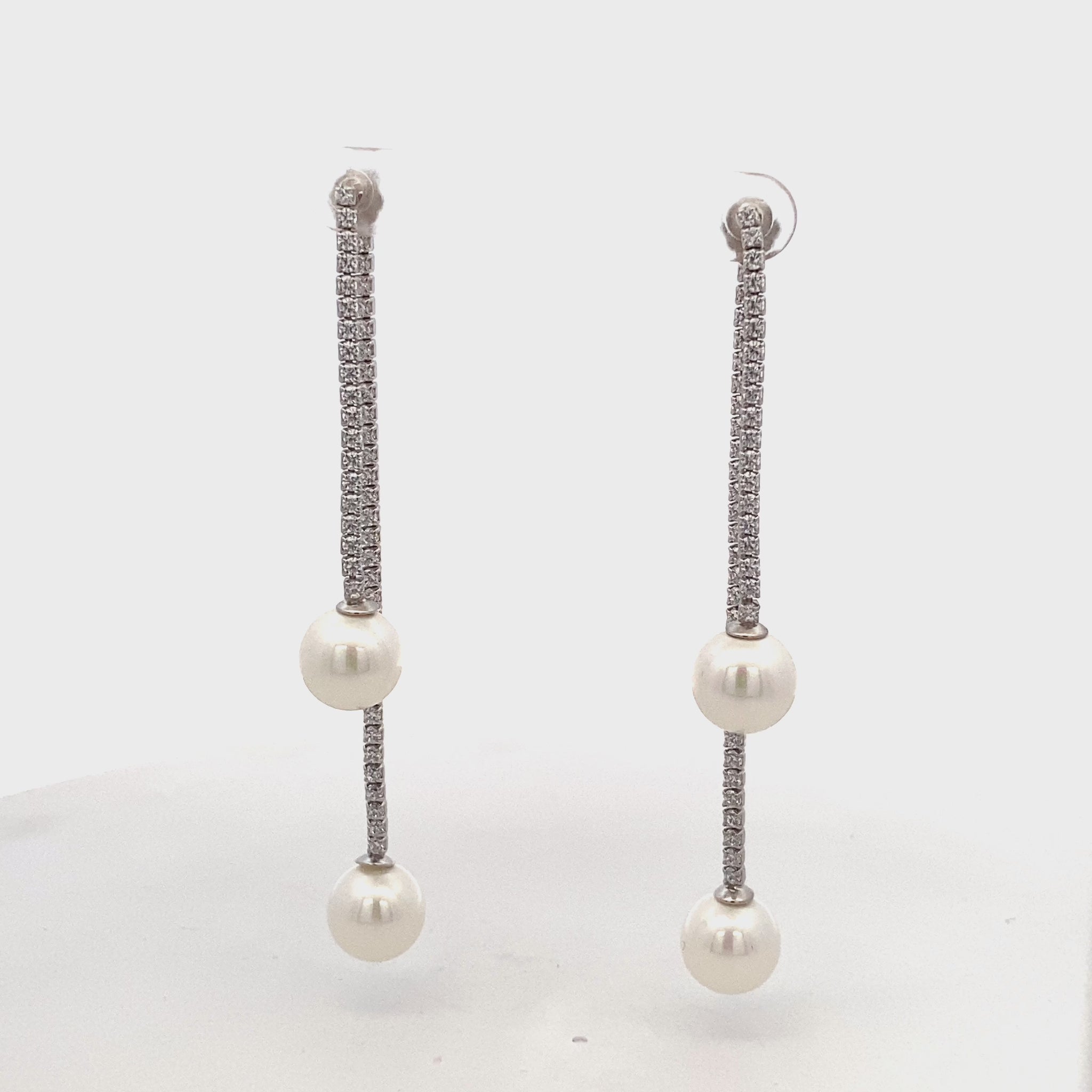 Classic silver and pearl drop earrings for women