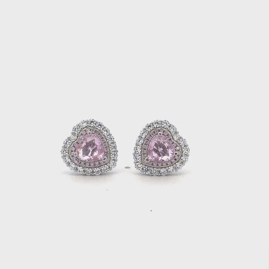 92.5 silver heart earrings with pink center stone and sparkling zircons.