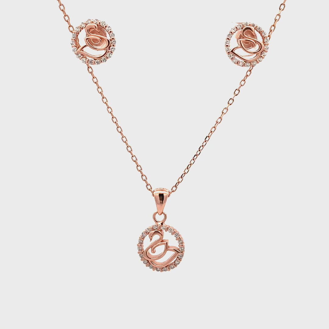 Elegant swan-shaped pendant with zircon stones, crafted in high-quality rose gold polish.