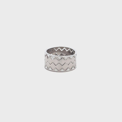 Elegant silver ring combining four bands into one seamless piece.