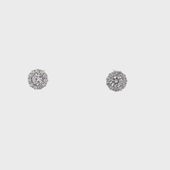 Dazzling Swarovski zircon studs with a removable solitaire for versatile styling.
