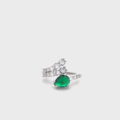 Elegant green gemstone ring in sterling silver with sparkling zircon details.