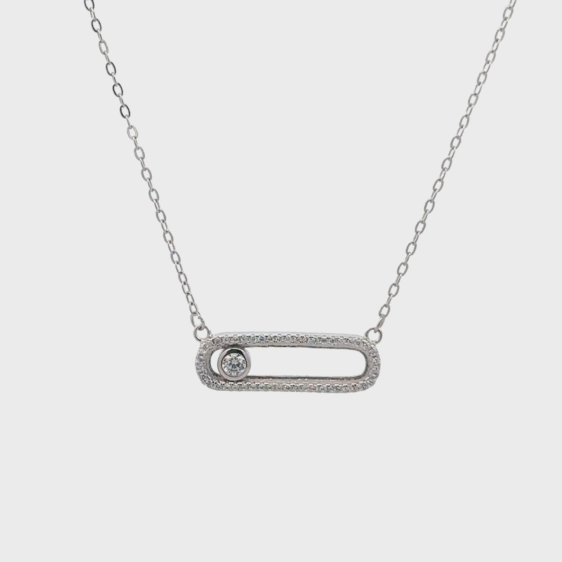 Silver chain with white Swarovski zircon rectangular pendant.