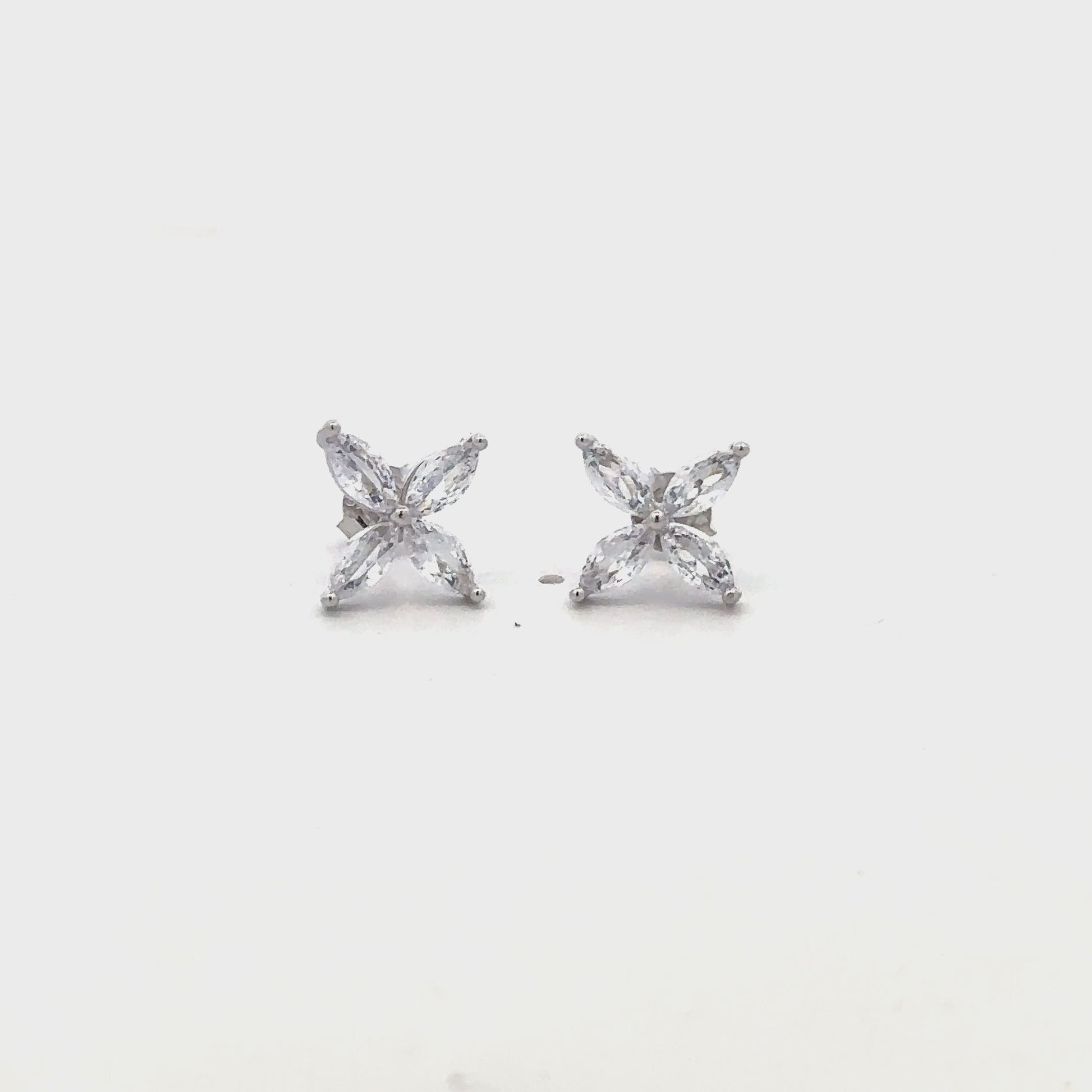 Elegant small silver earrings featuring white stone detail