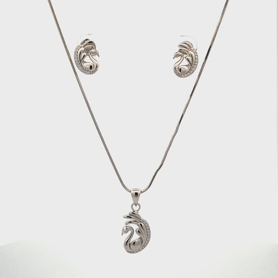 Elegant swan pendant crafted in silver polish with long neck and graceful wings.

Luxury silver swan pendant with zircon
