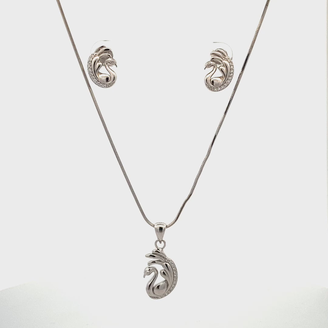 Elegant swan pendant crafted in silver polish with long neck and graceful wings.

Luxury silver swan pendant with zircon