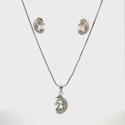 Elegant swan pendant crafted in silver polish with long neck and graceful wings.

Luxury silver swan pendant with zircon