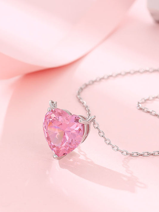 Sterling silver heart pendant chain with semi-precious pink stone.